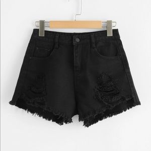Black ripped jean shorts